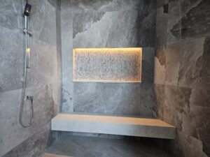 Custom LED feature-wall lighting installed by Pfitztech in a Lake Country home