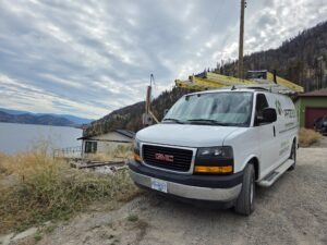 Pfitztech electrician service van at an Okanagan lake near Vernon BC