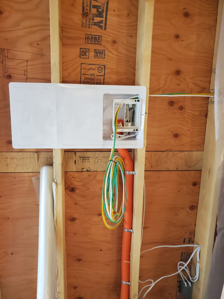 Low-voltage rough-in photographed before drywall