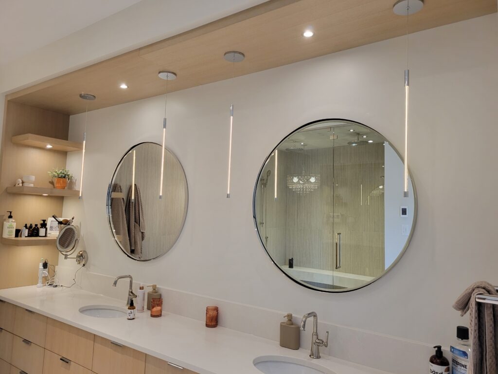Ensuite linear pendants and accent lighting in an Okanagan home