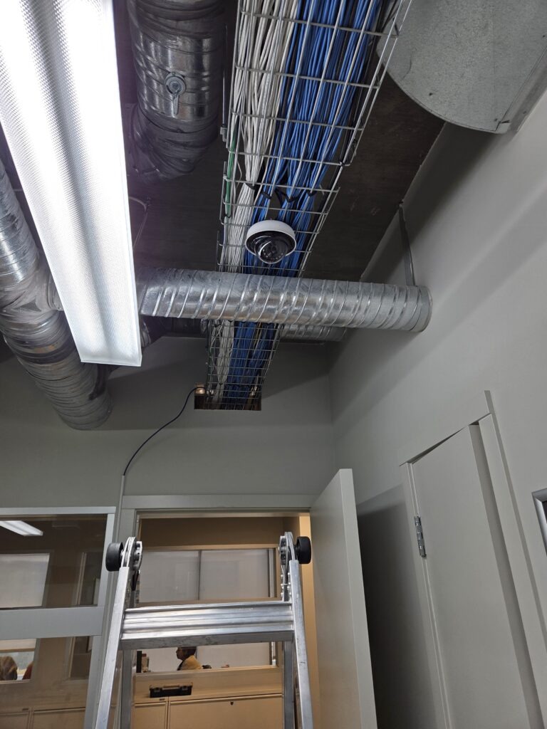 Ceiling camera and cable tray on a commercial job