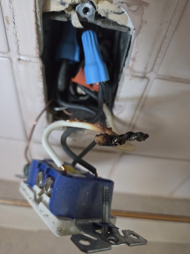 Heat-damaged electrical device found on a Pfitztech service call